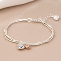 Triple Chain Bracelet With Puffed Hearts