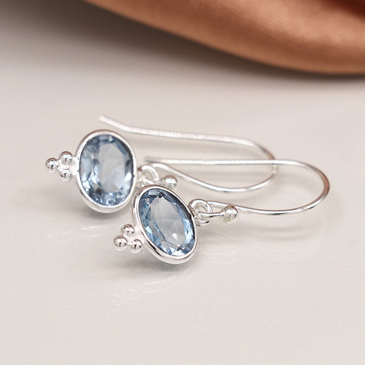 Sterling Silver Blue Topaz Oval Drop Earrings