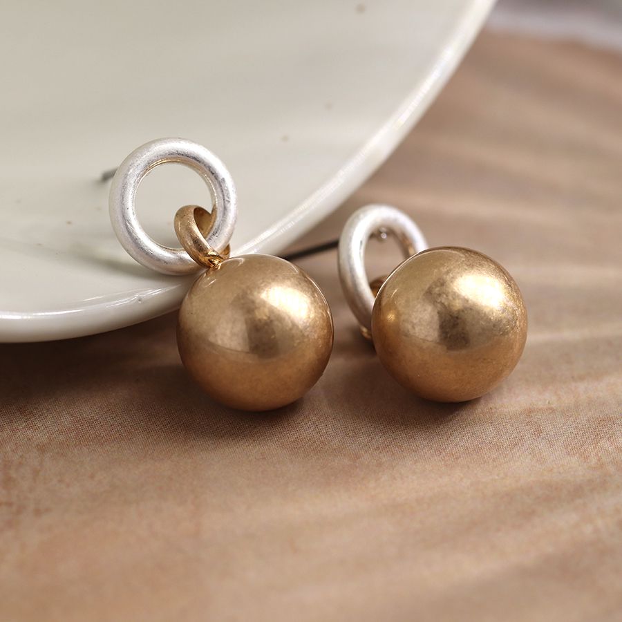 Worn Golden Hoop & Ball Drop Earrings